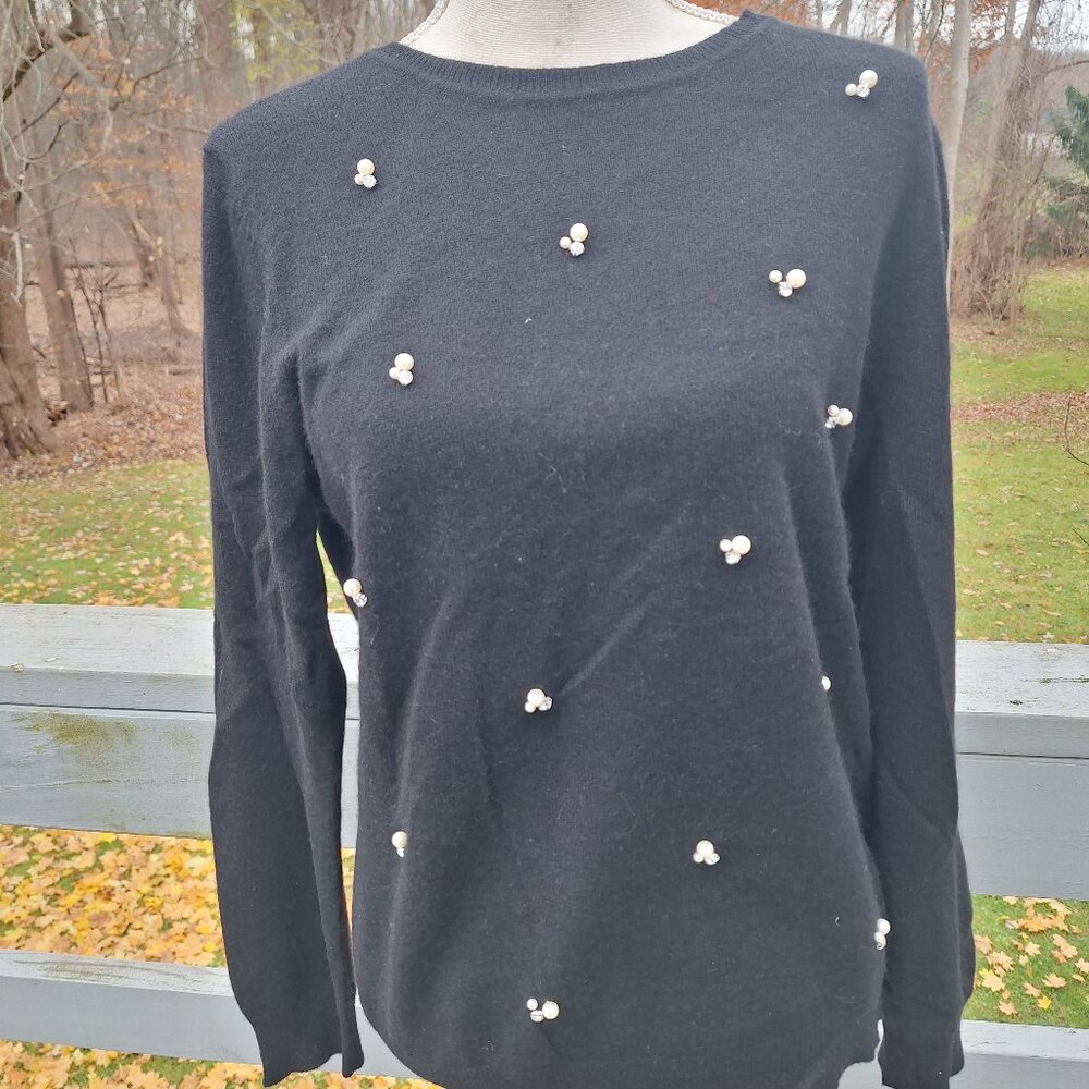 Black Cashmere sweater with faux pearl and rhinestone accents.